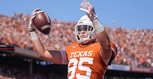 Texas Longhorns tight end Gunnar Helm celebrates a touchdown during a college football game.
